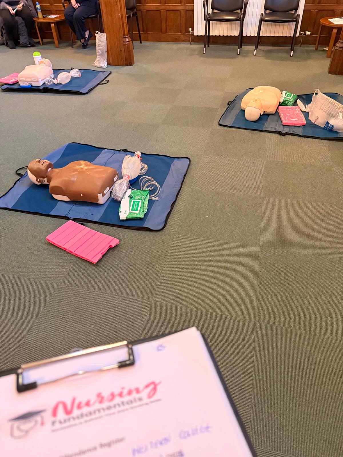CPR manikins and training materials prepared for a Nursing Fundamentals BLS session